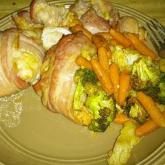 A picture of Bacon Wrapped Stuffed Boneless Chicken Thighs.