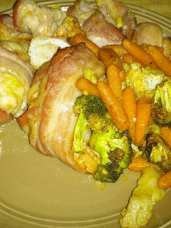 A picture of Bacon Wrapped Stuffed Boneless Chicken Thighs.