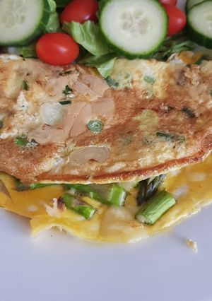 A picture of Quick asparagus, spring onion and cheddar omlette.