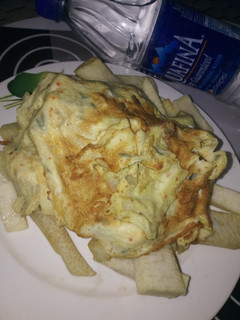 A picture of Fried Yam with Egg and Beverage Tea.