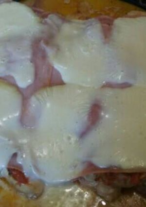 Una foto de Pollo a la pizza