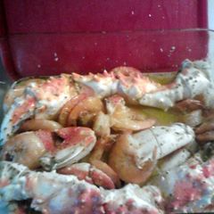A picture of baked crab and shrimp.