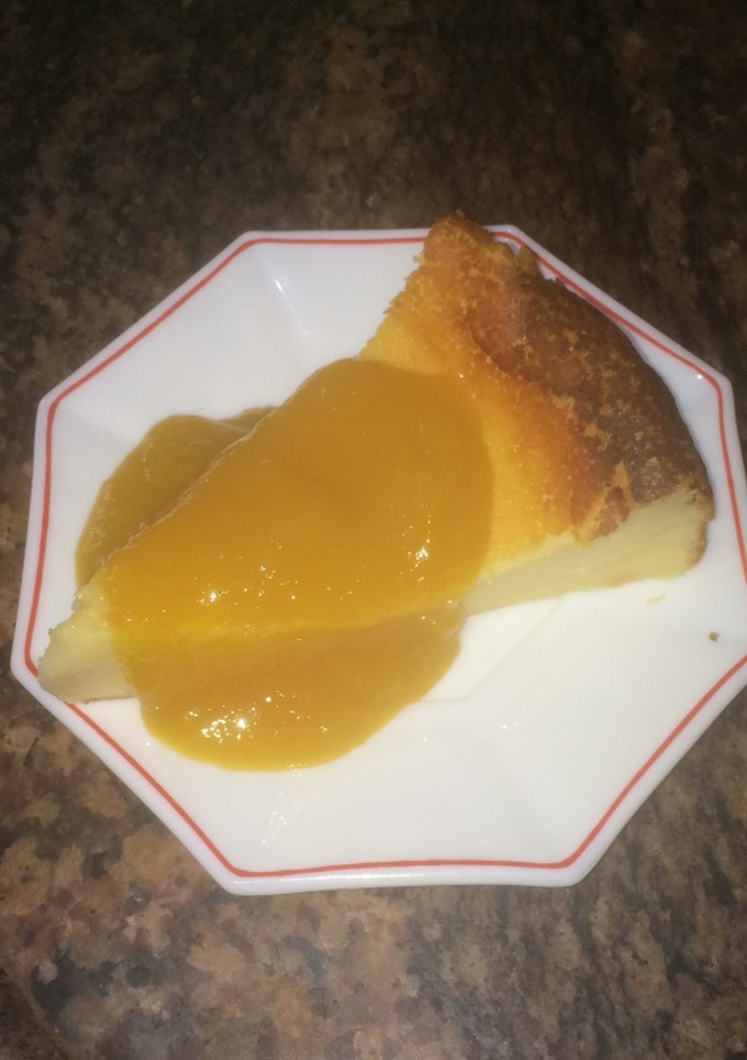Una foto de Tarta de mascarpone con coulis de mango