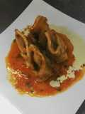 Capelettini relleno de carne con salsa