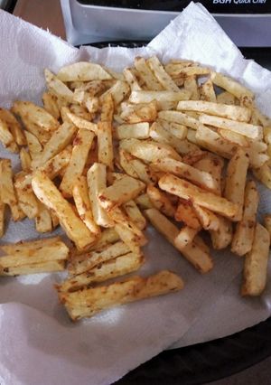 Una foto de Papas fritas condimentadas