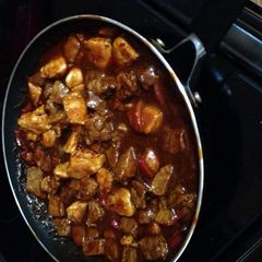A picture of Beef Sirloin Tips And Chicken With Pepper Sauce.