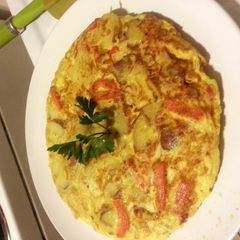 A picture of Tortilla Espanola, Chorizo red pepper riff (TAPAS).
