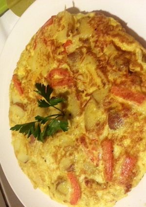 A picture of Tortilla Espanola, Chorizo red pepper riff (TAPAS).