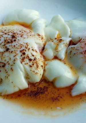 A picture of Poached Eggs With Spicy Butter.