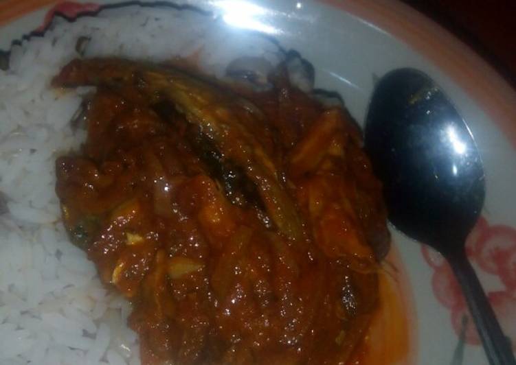 Rice and beans with smoked fish stew