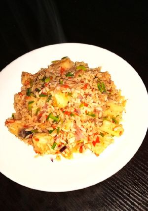 A picture of Jallof rice with yam.