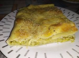 Una foto de Torta combinada de zapallitos y puerros