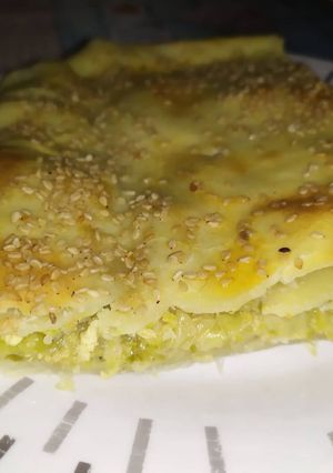 Una foto de Torta combinada de zapallitos y puerros