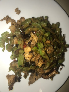 A picture of Bitter gourd with pork belly with black bean sauce on.