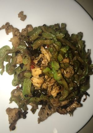 A picture of Bitter gourd with pork belly with black bean sauce on.