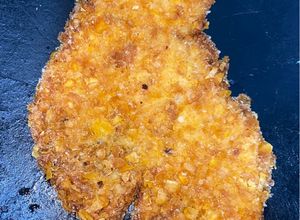 Una foto de Milanesa de pollo crispy