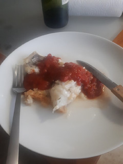 Una foto de Bacalao con salsa de albahaca bio