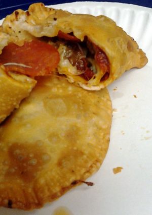 A picture of pizza empanadas.