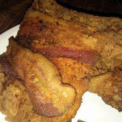A picture of Extra Crispy Bacon Wrapped Porkchops.