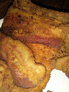 A picture of Extra Crispy Bacon Wrapped Porkchops.