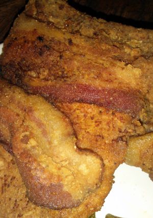 A picture of Extra Crispy Bacon Wrapped Porkchops.