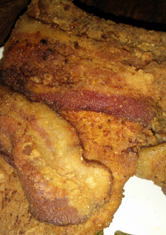 A picture of Extra Crispy Bacon Wrapped Porkchops.