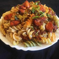 A picture of Chicken Tikka pasta dum biryani.