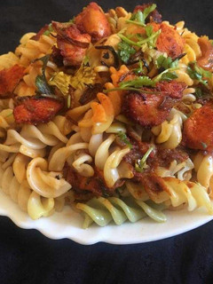 A picture of Chicken Tikka pasta dum biryani.
