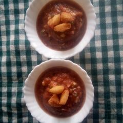 A picture of Simple gazpacho with bread croutons.