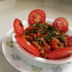 A picture of चपाती टमाटर में.