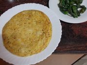 Una foto de tortilla de papa y camote