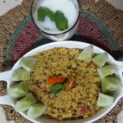 A picture of Mugachi Khichadi aani Masalyache Taak: Moong Daal/Sprouts Khichdi with spiced Buttermilk.
