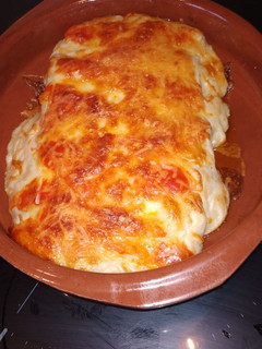 Una foto de Canelones de carne picada y verduras