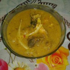 A picture of Moong daal with head part (macher matha diye mooger daal).