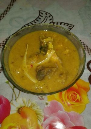 A picture of Moong daal with head part (macher matha diye mooger daal).