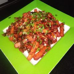 A picture of Schezwan chilli potato.