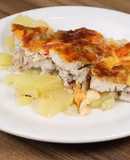 Pechuga de pollo con papas y queso manchego