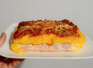 Una foto de Polenta Rellena de jamón y queso 🧀