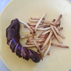 A picture of Air fried Russian and chips.