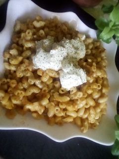 صورة لوصفة معكرونة بالجبن وصلصة الطماطم