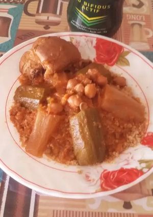 A picture of Barbousha (Wheat Couscous Steamed in a Couscous Pot).