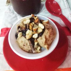 A picture of Millet,dry fruits and chocolate icecream.
