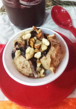 A picture of Millet,dry fruits and chocolate icecream.