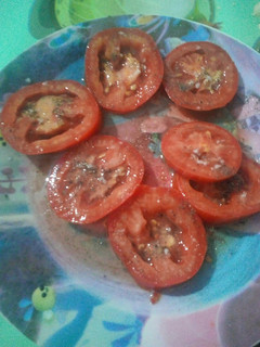 Una foto de Tomate con pimienta
