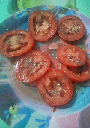 Una foto de Tomate con pimienta