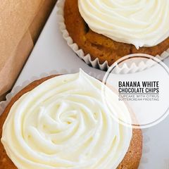 A picture of Banana White Chocolate chips Cupcake with Citrus Buttermilk Frosting.
