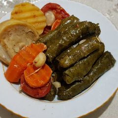 A picture of Stuffed grape/vine leaves (Yaprak) with artichoke.