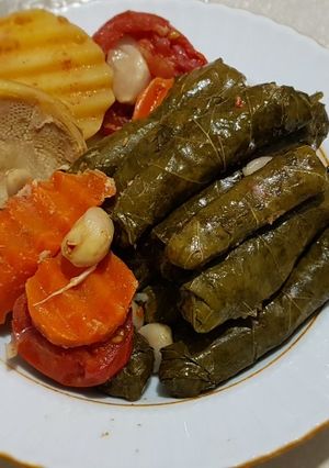 A picture of Stuffed grape/vine leaves (Yaprak) with artichoke.