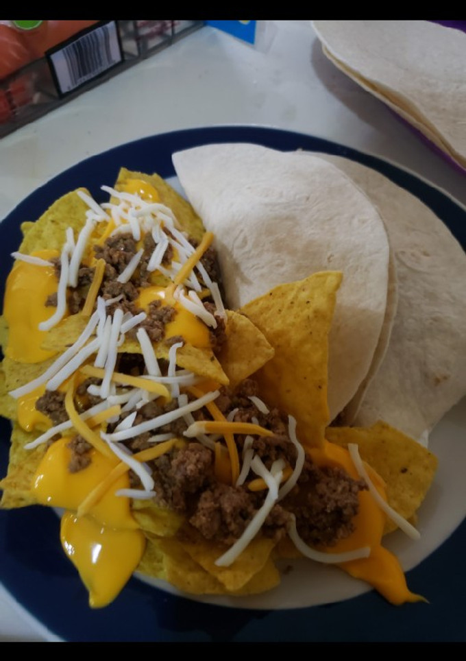 Una foto de Nachos con carne molida y queso