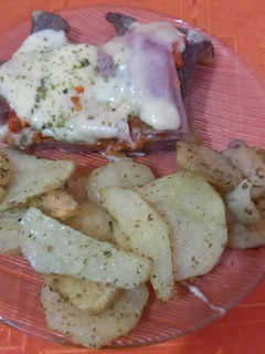 Una foto de "Matambre A La Pizza Con Papas al Horno" 😋😋😋😋